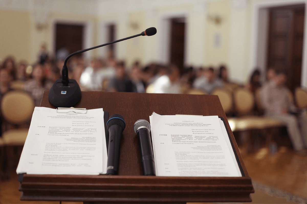 podium with two speeches and microphones